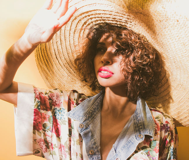 A woman in a big hat