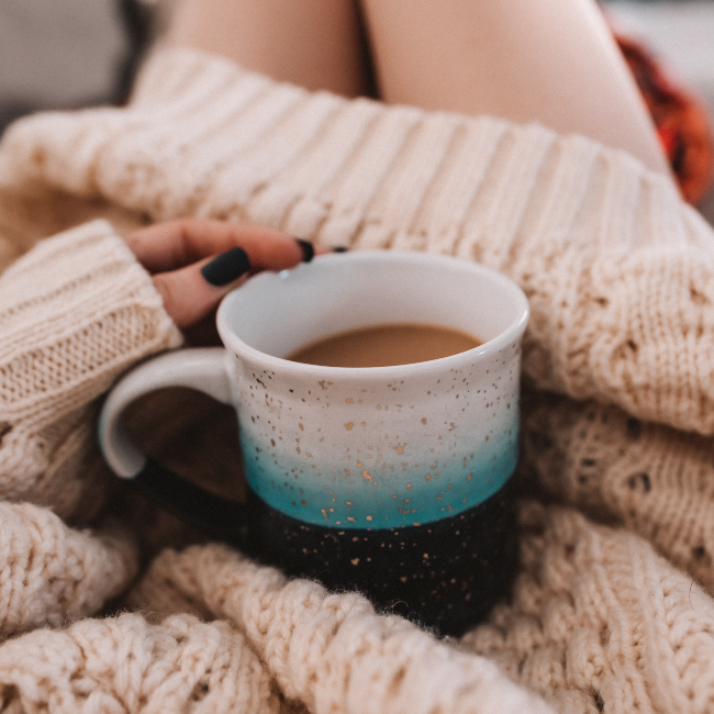 Woman holding a mug of tea